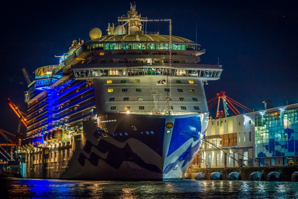 cruise ship docked at night